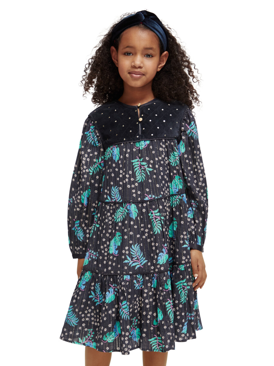 vestido de niña con detalle de terciopelo estampado por todas partes