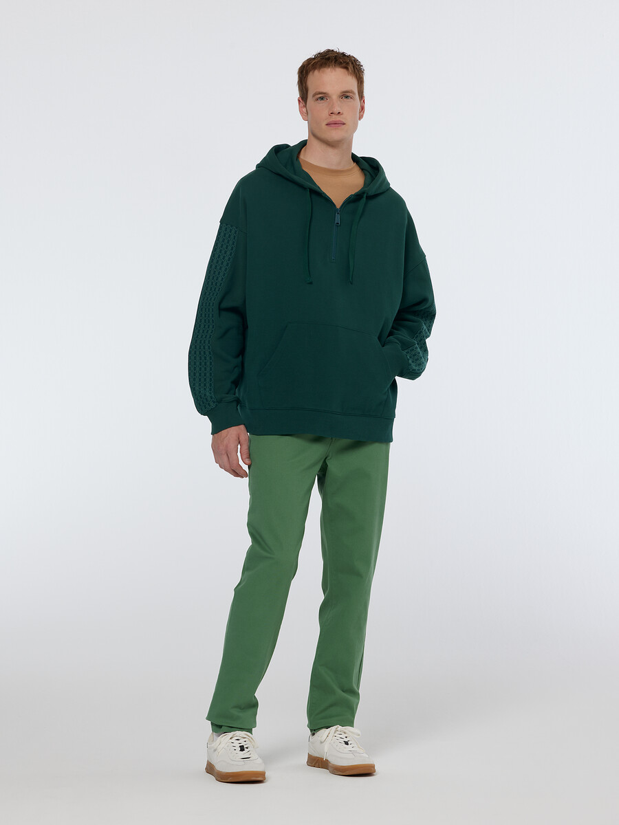 sudadera con capucha holgada con media cremallera y ribete de canalé
