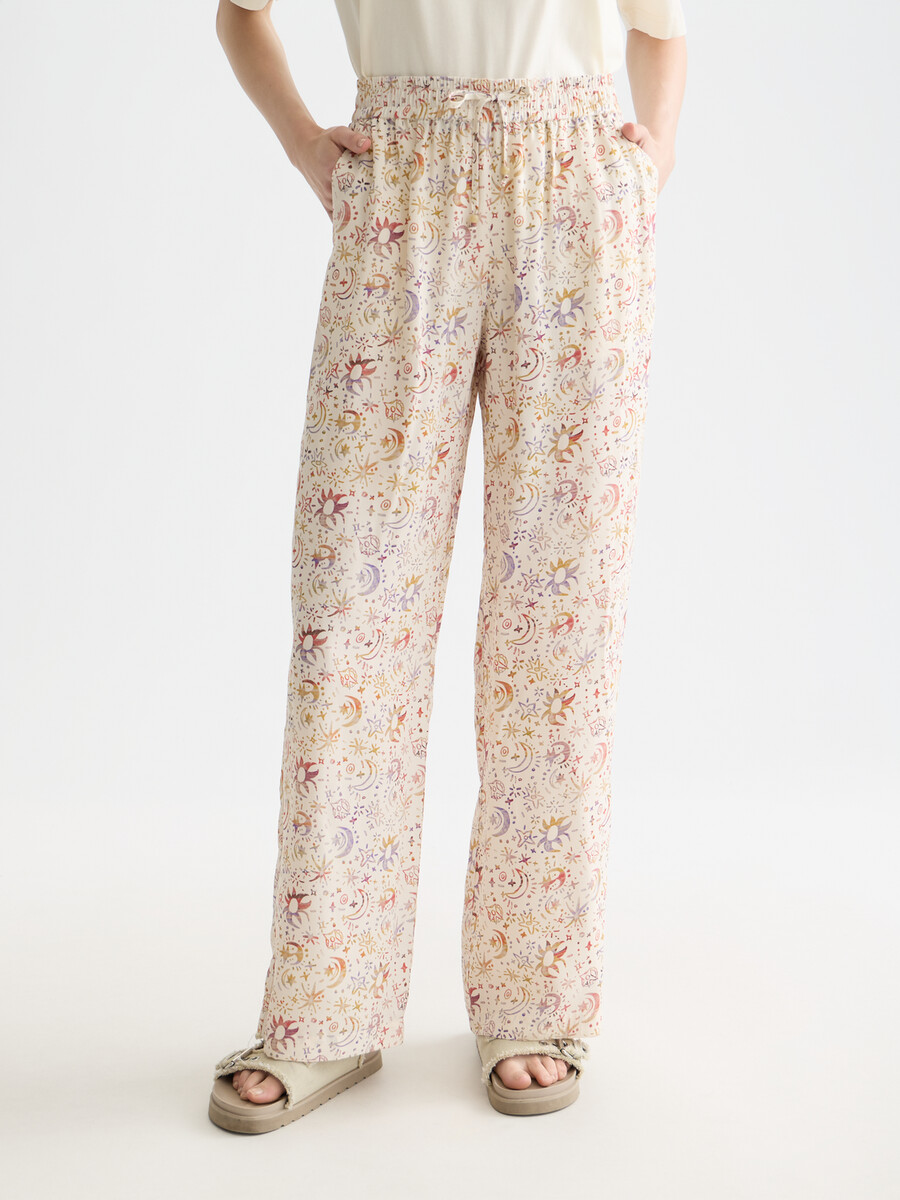 gia - pantalones de tiro medio con pernera ancha y estampado integral