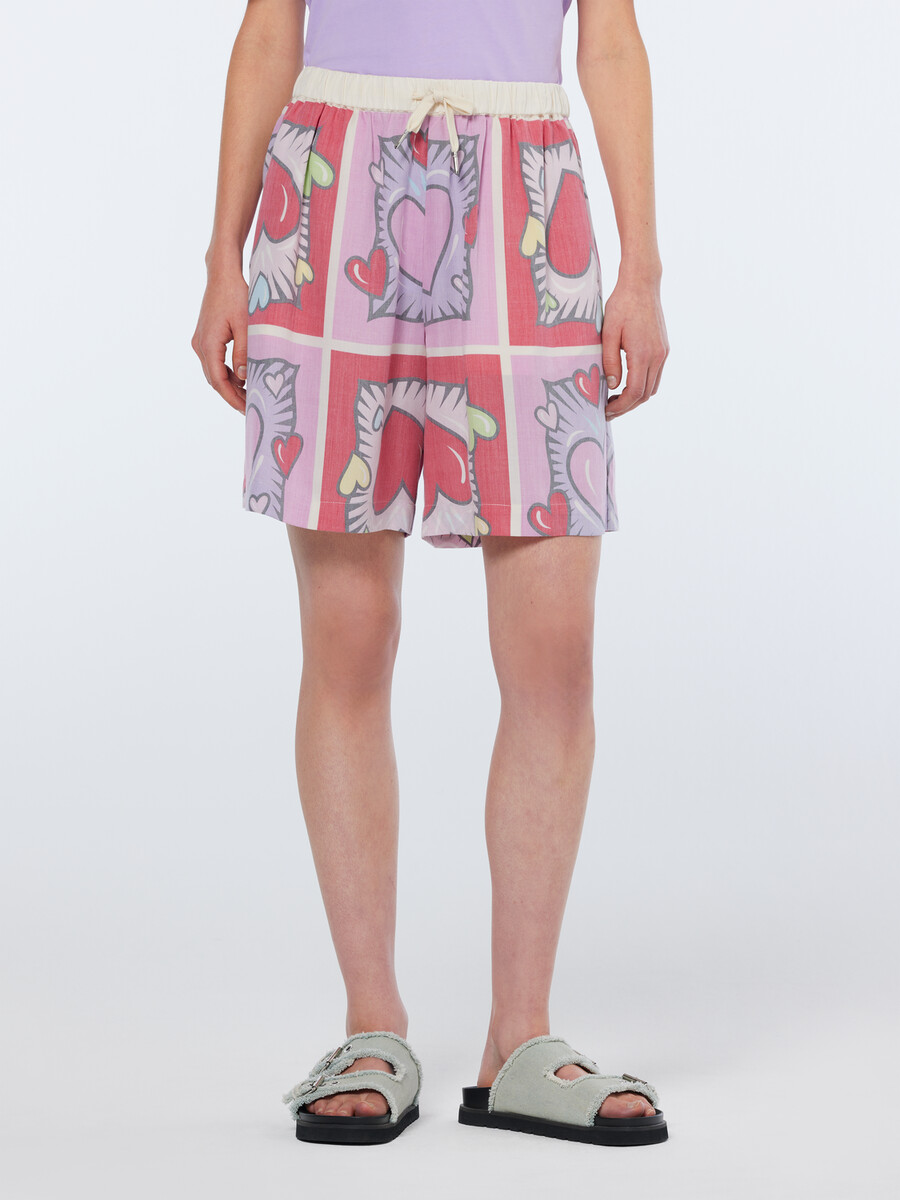 pantalón corto con estampado de corazones de scotch soda x burton morris